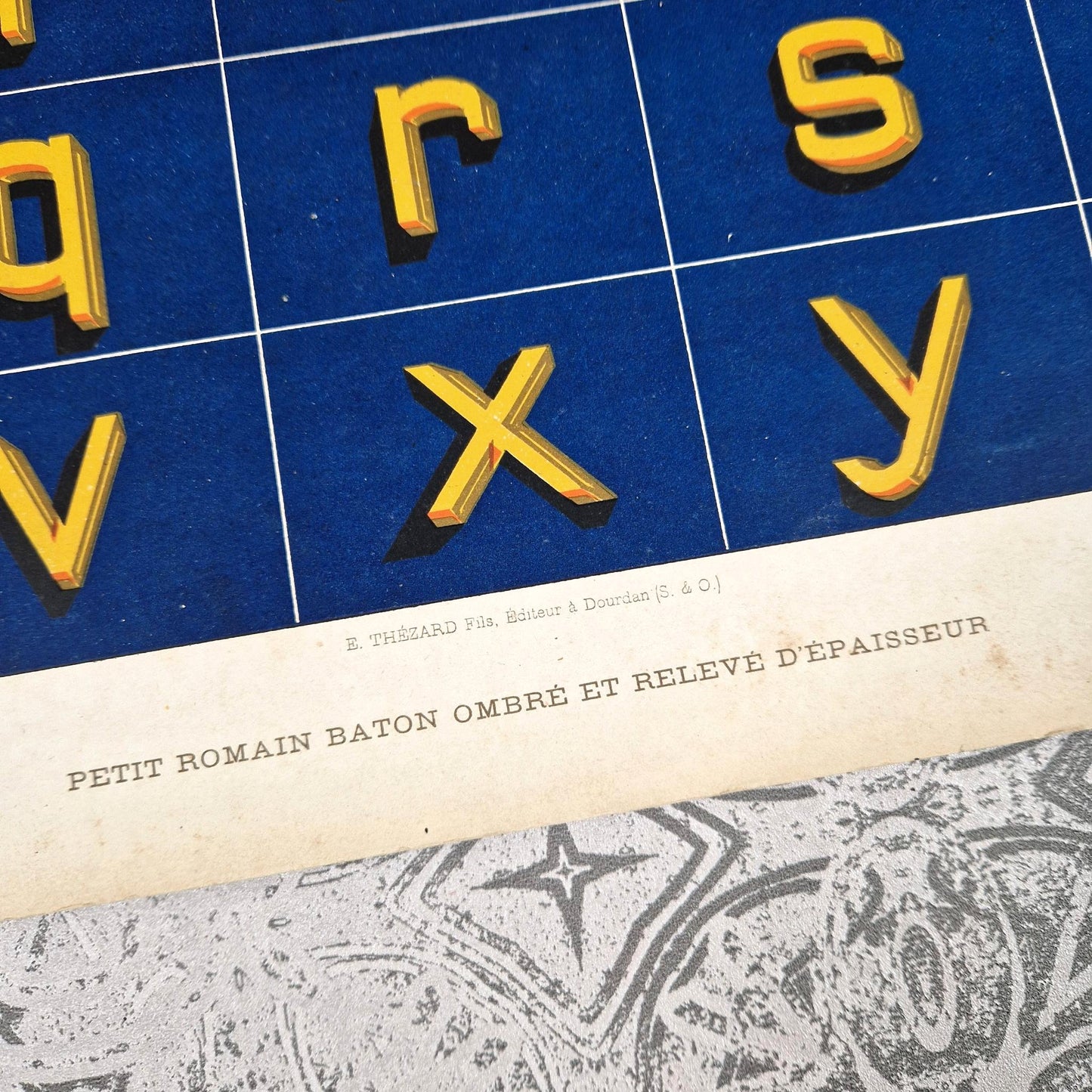 blue yellow relief typography 1900