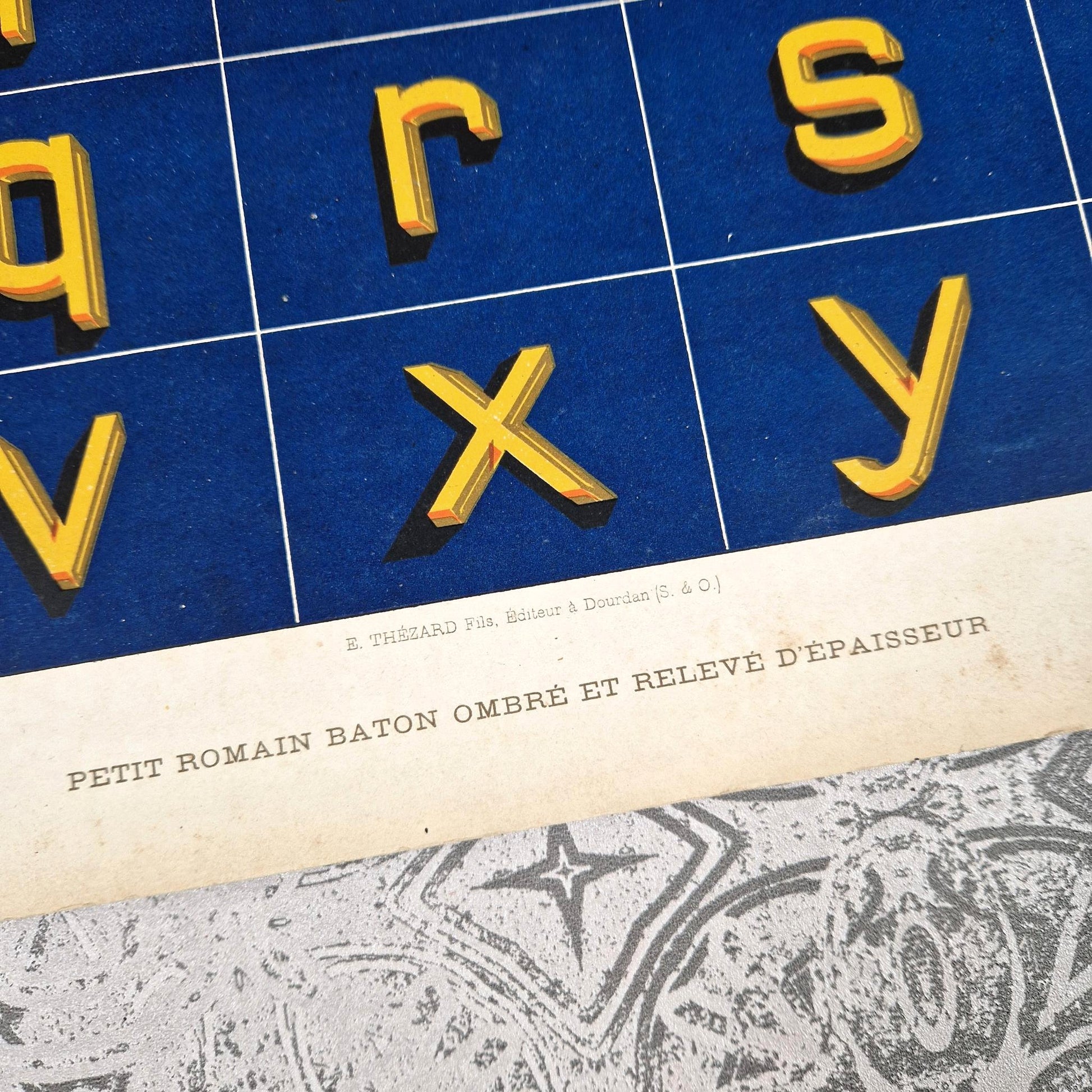 blue yellow relief typography 1900