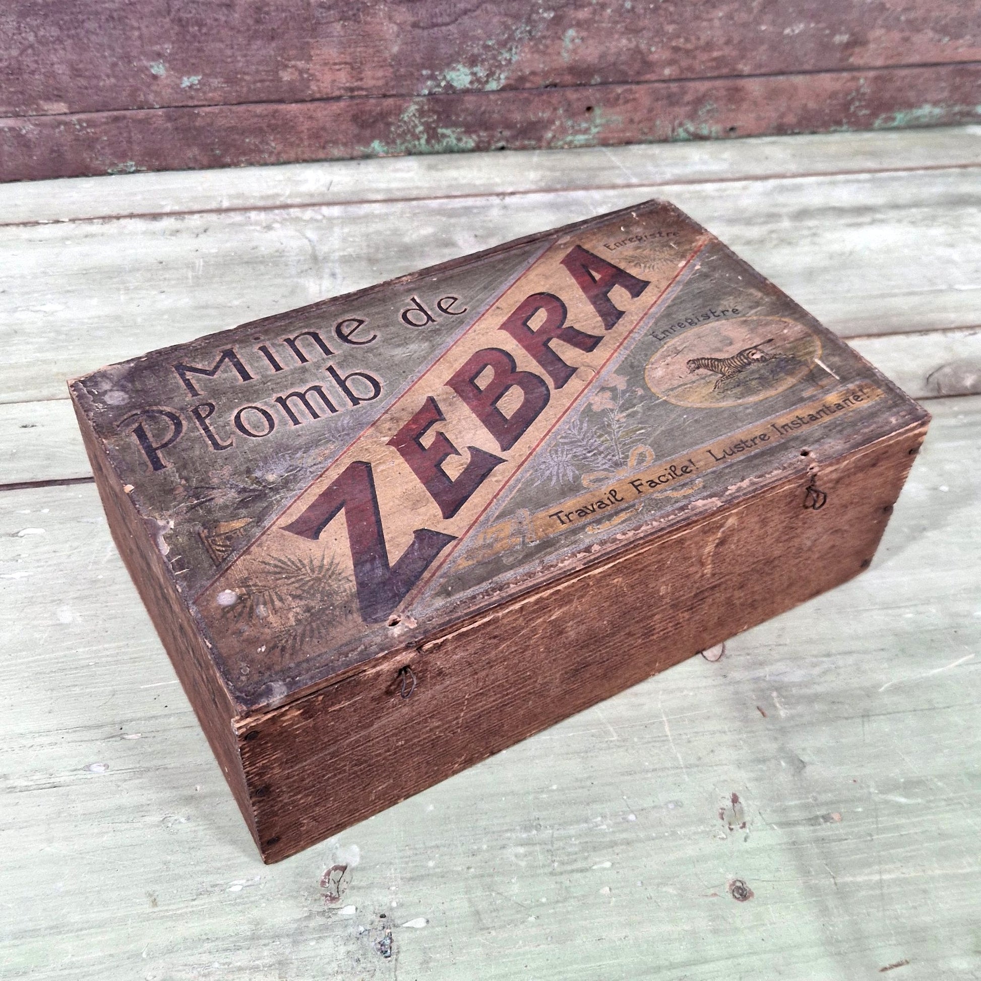 boite publicitaire ancienne zebra mine plomb