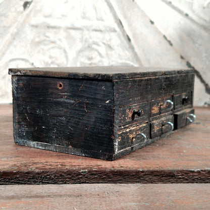 boite tiroirs noire horloger bijoutier