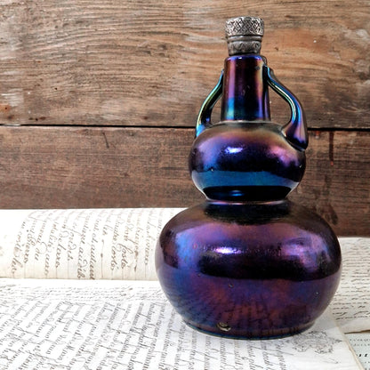 bouteille double panse verre irisé ancienne