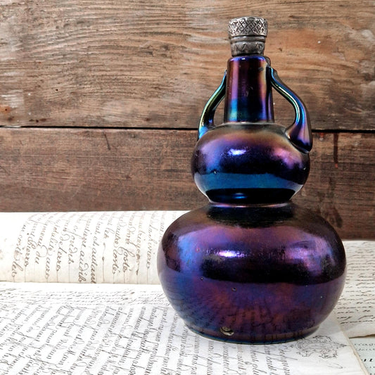 bouteille double panse verre irisé ancienne