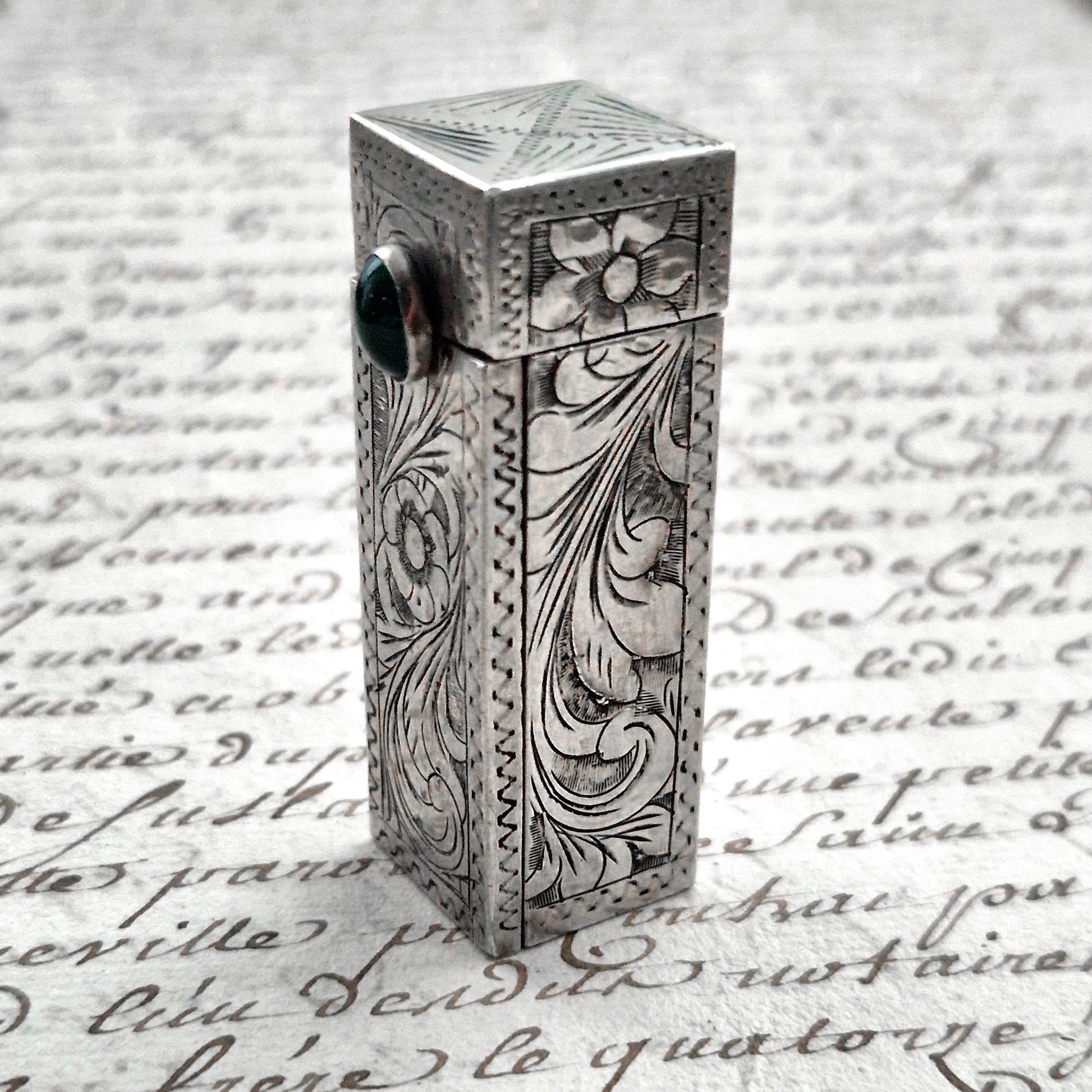 emerald glass lipstick holder