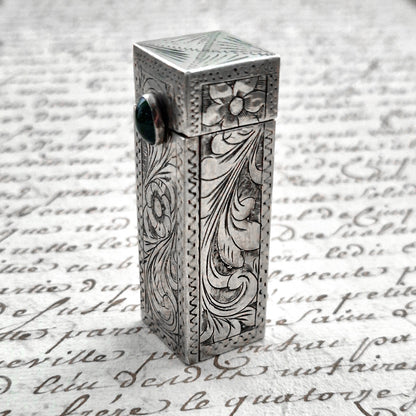 emerald glass lipstick holder