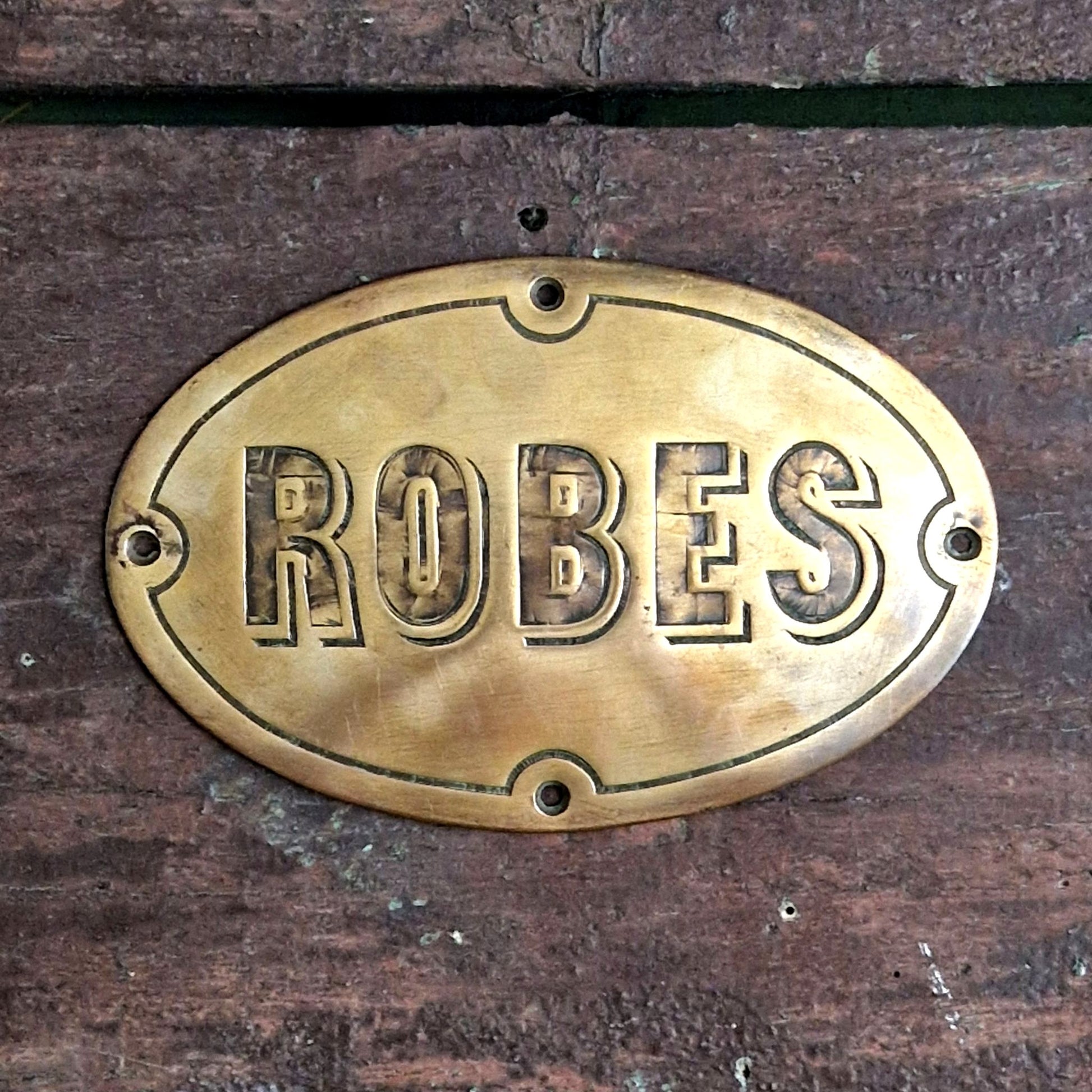 enseigne laiton vetement robe