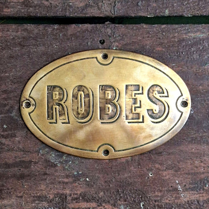 enseigne laiton vetement robe