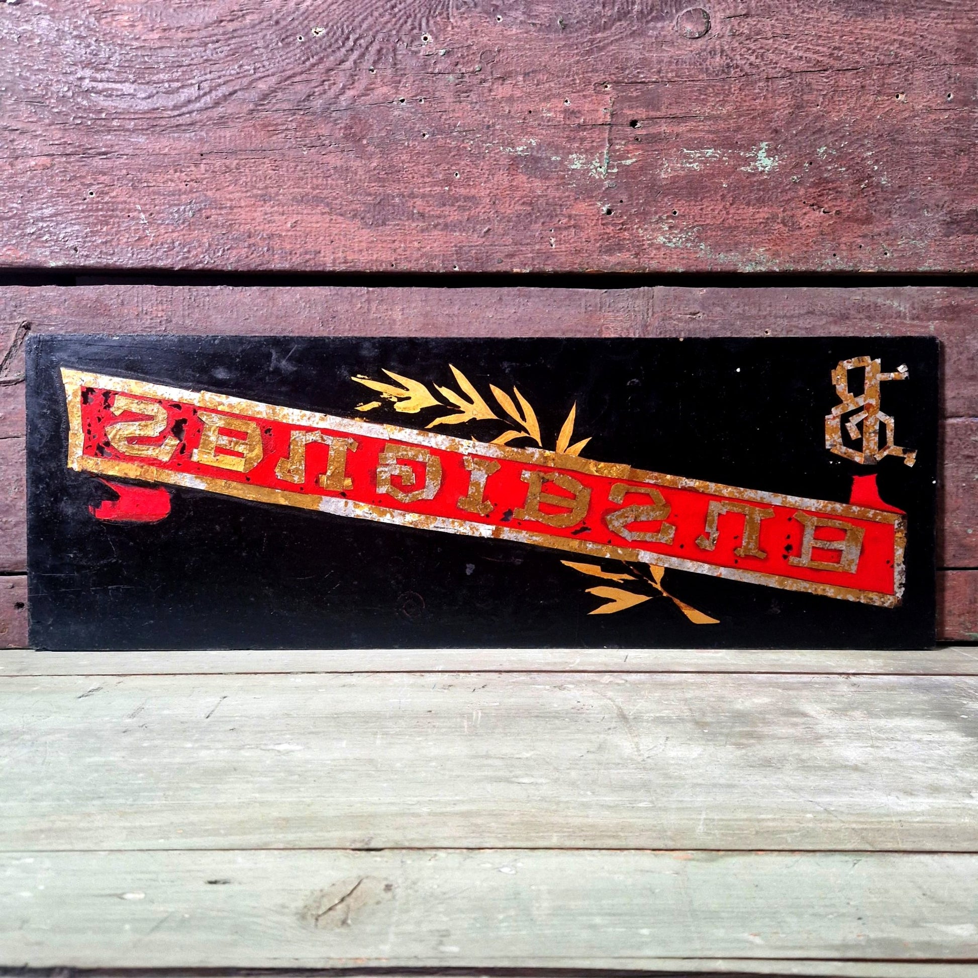 enseigne peinte en verre