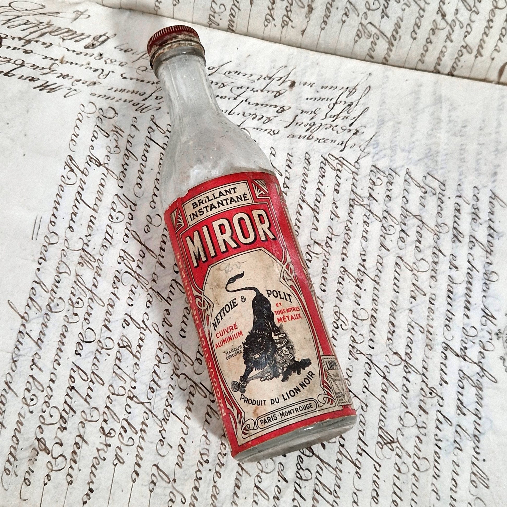 flacon ancien miror lion noir