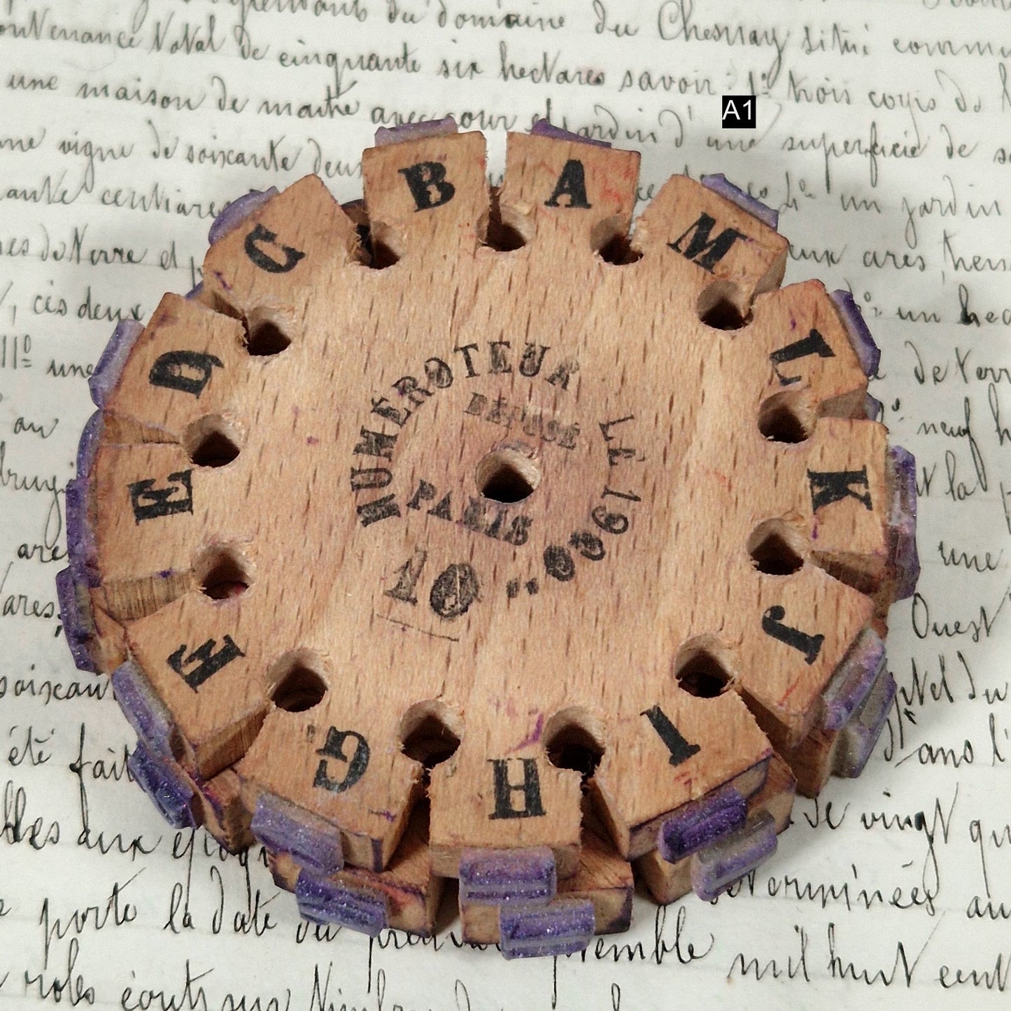 french typography wooden wheel