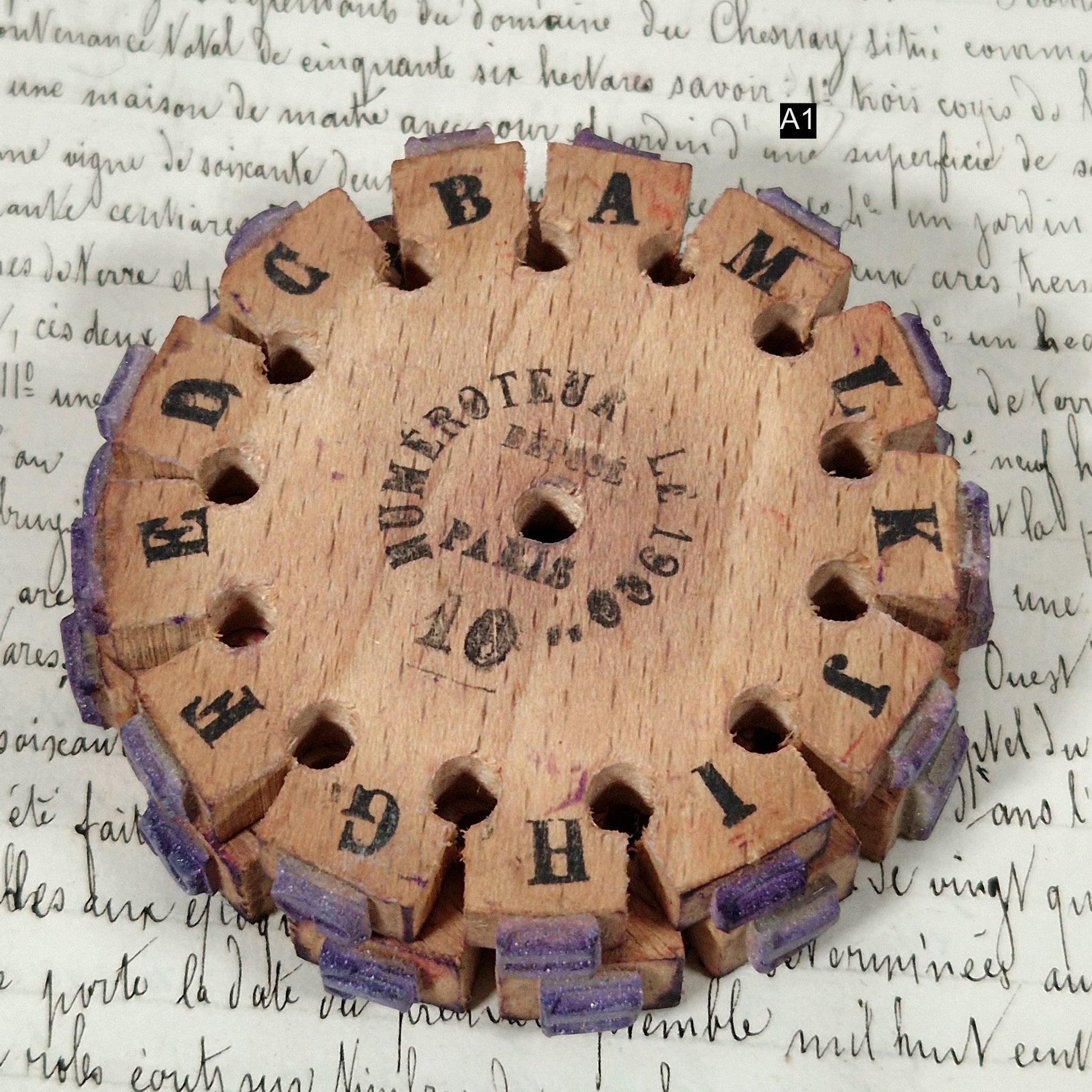 french typography wooden wheel
