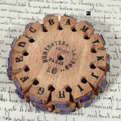 french typography wooden wheel