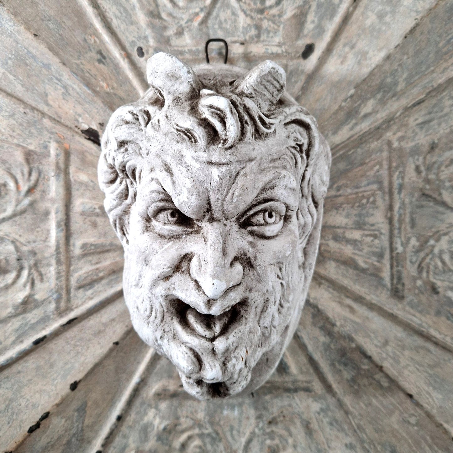 gothic demon face plaster sculpture