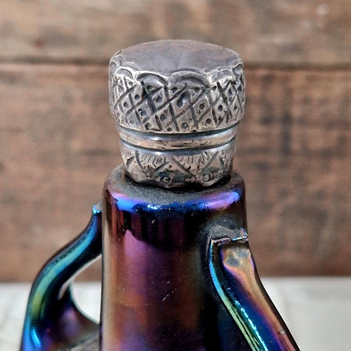 iridescent glass bottle silver cap art nouveau