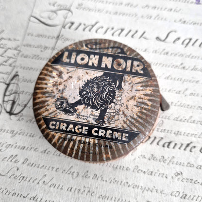 lion noir publicite noir argent