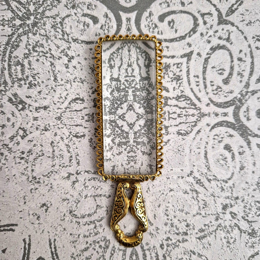 loupe dorée de lecture XIXème