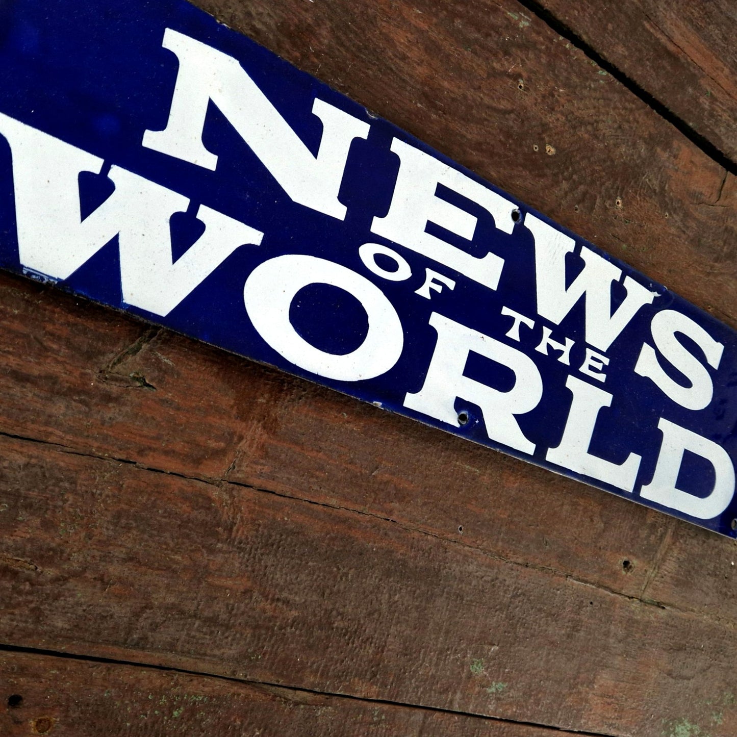 old newspaper enamel advert