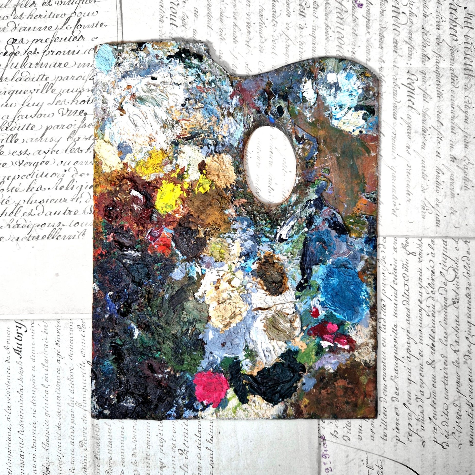 old painter hand palette heavy paint