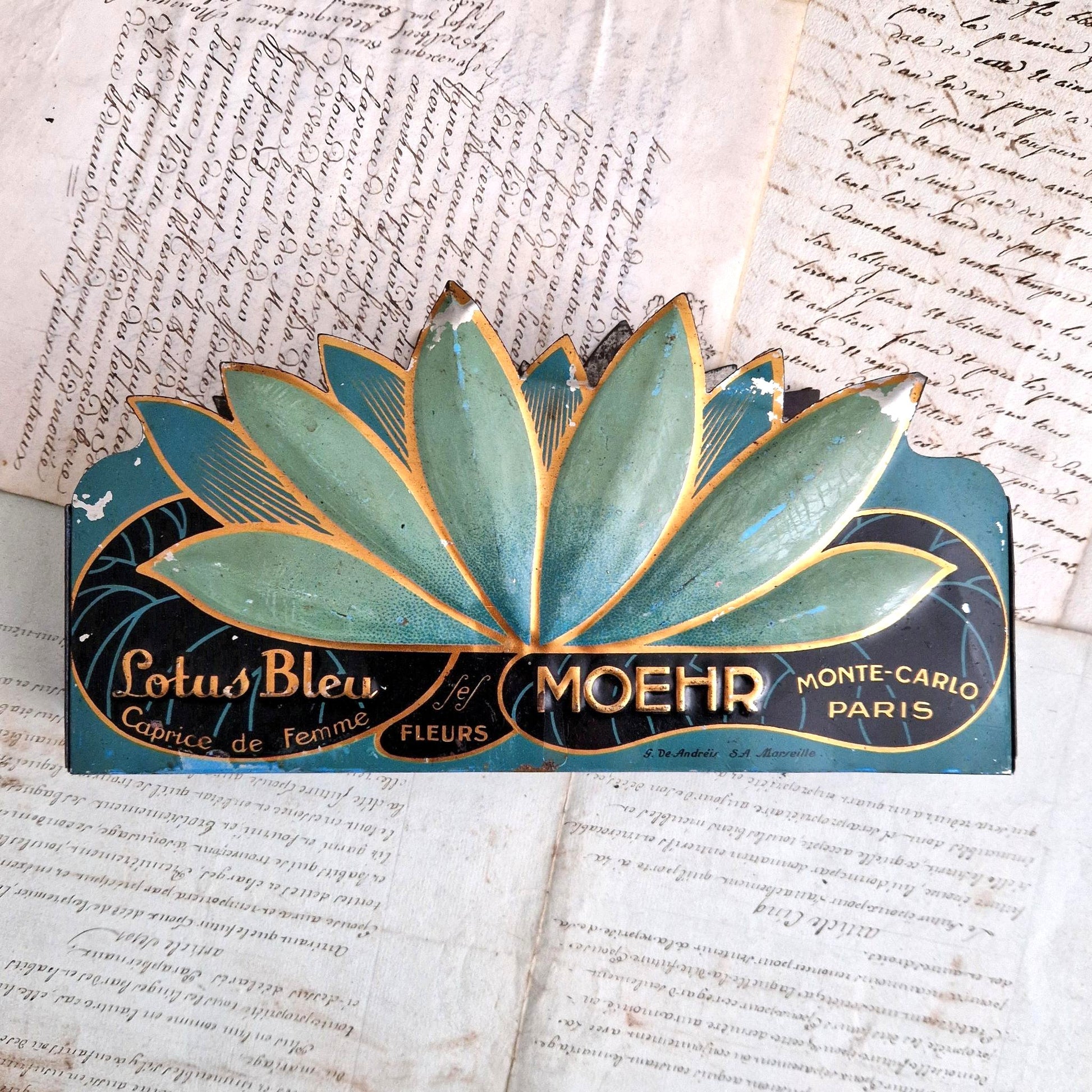 old tin advertising lotus