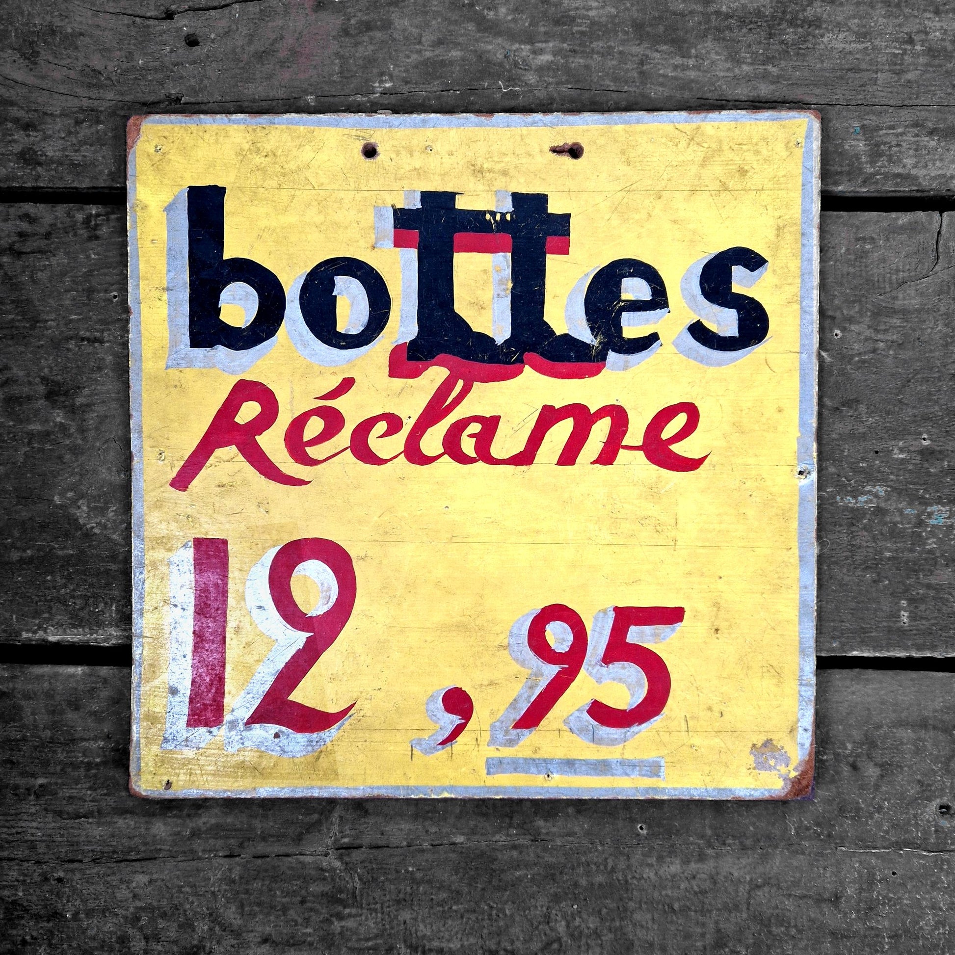 pancarte publicitaire bottes