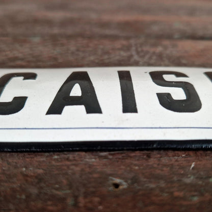 Plaque émaillée bombée « Caisse »