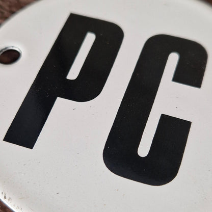 Round enamel sign "PC"