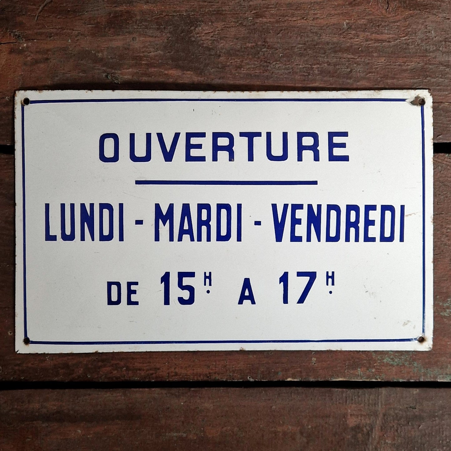 Enamel sign "Opening - Monday Tuesday Friday"