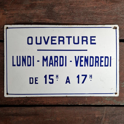 Enamel sign "Opening - Monday Tuesday Friday"