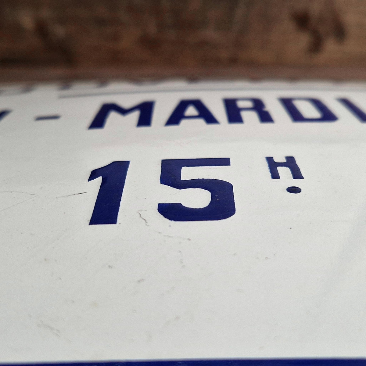 Enamel sign "Opening - Monday Tuesday Friday"