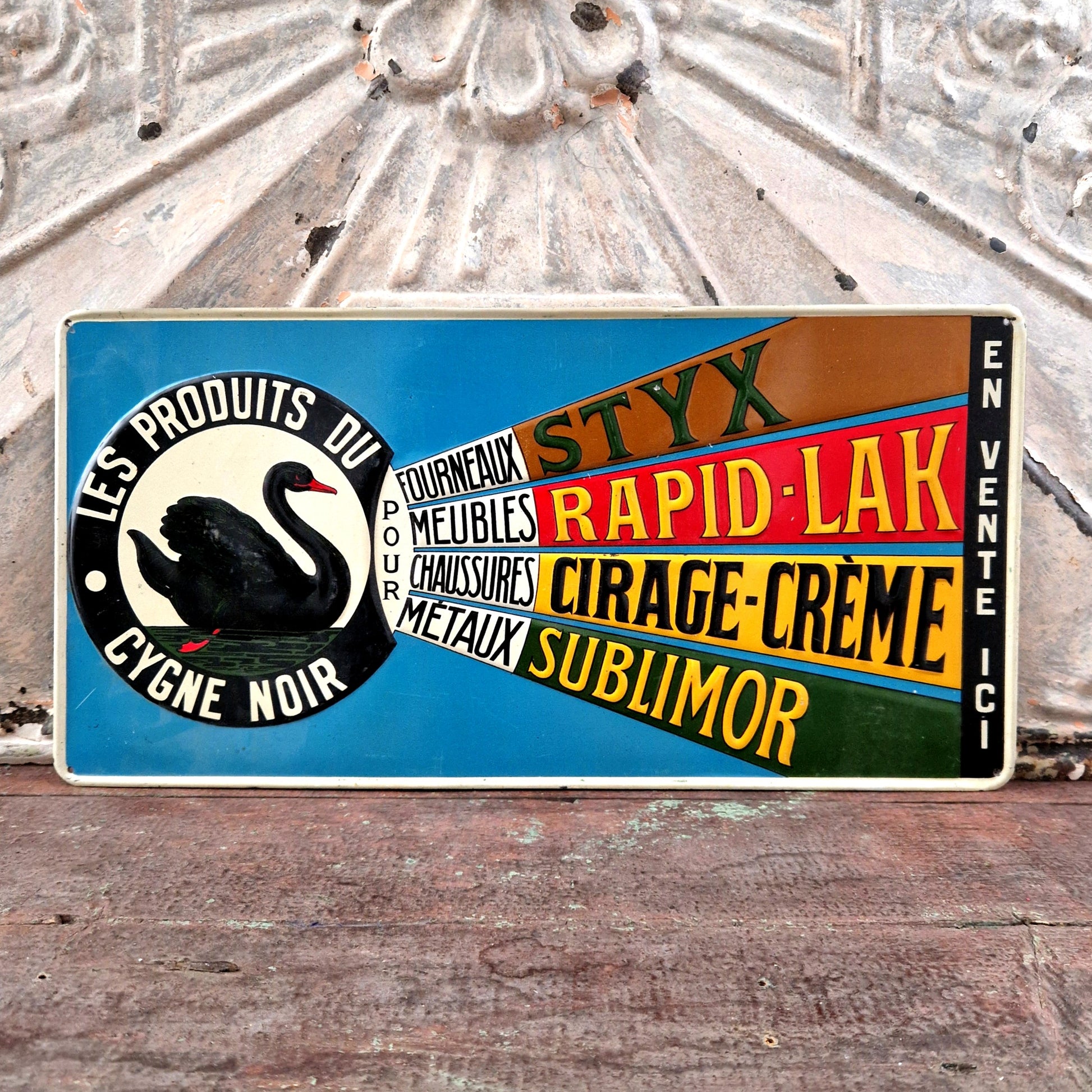 plaque publicitaire cygne noir