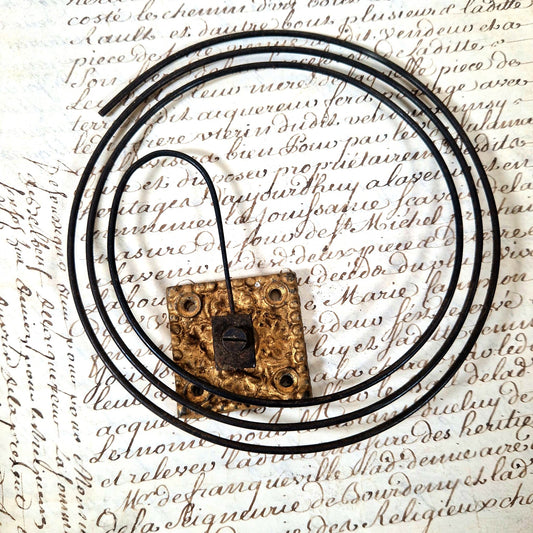 ressort de cloche ancienne bronze dore