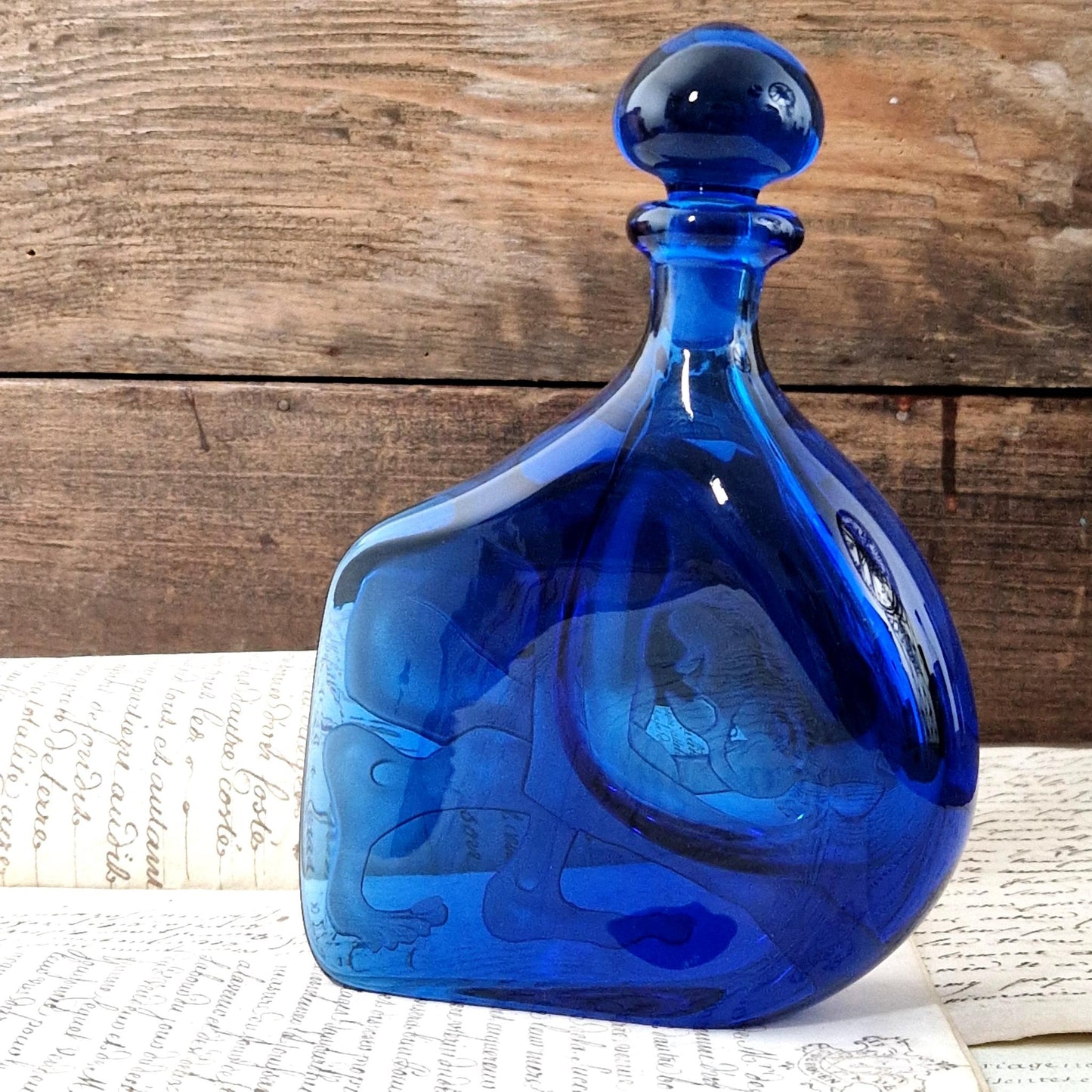 signed karlin rushbrooke etched glass bottle