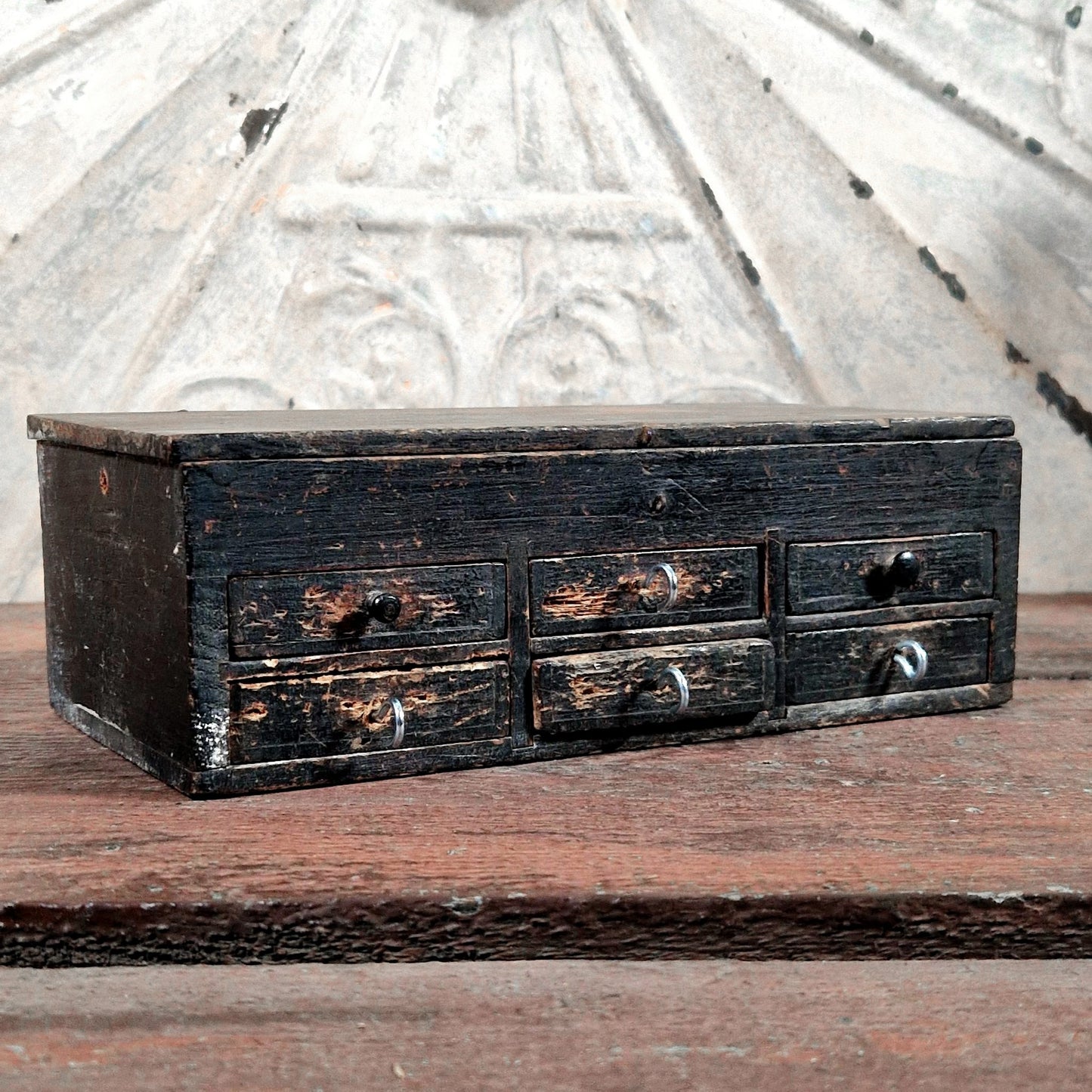 small black wooden drawer cabinet