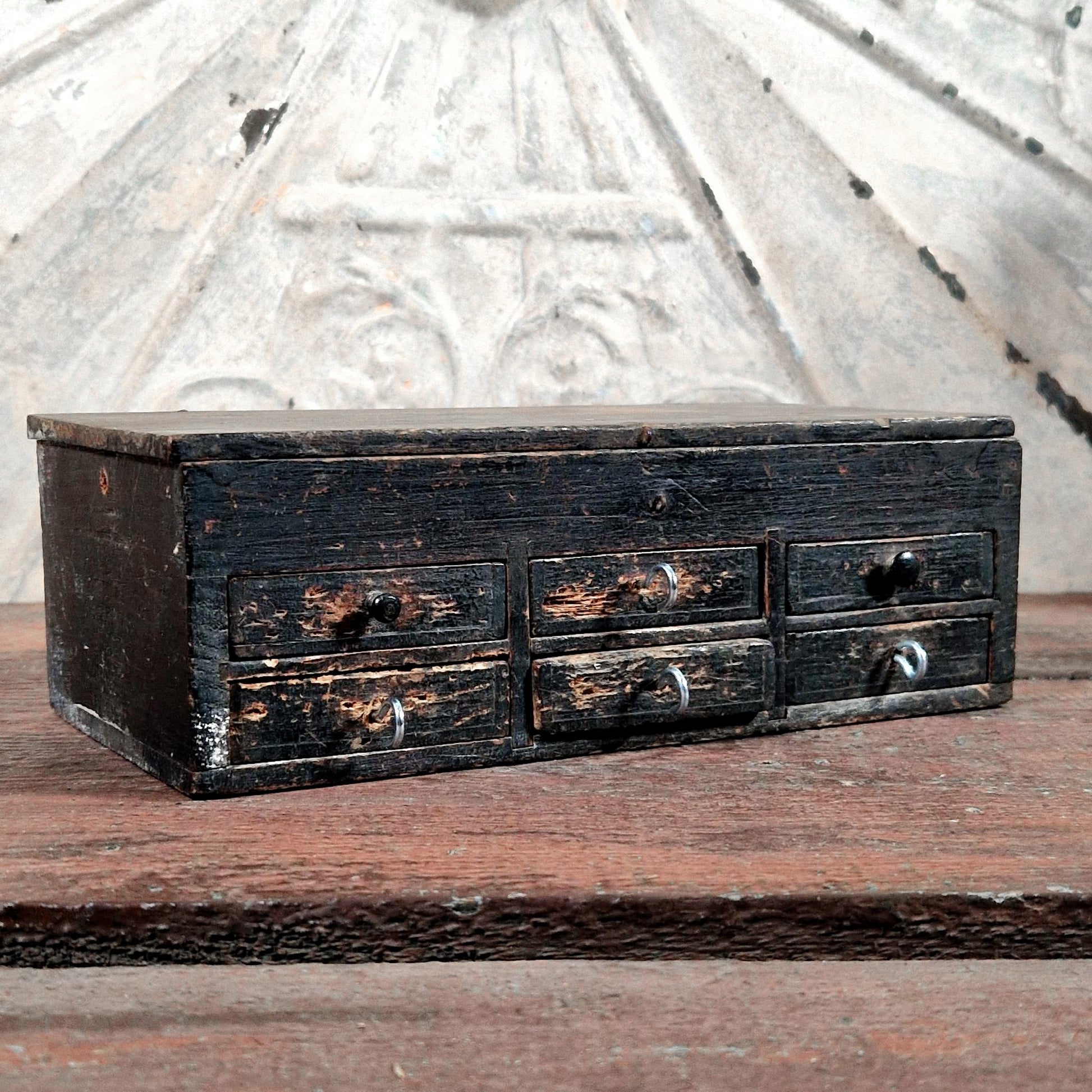 small black wooden drawer cabinet