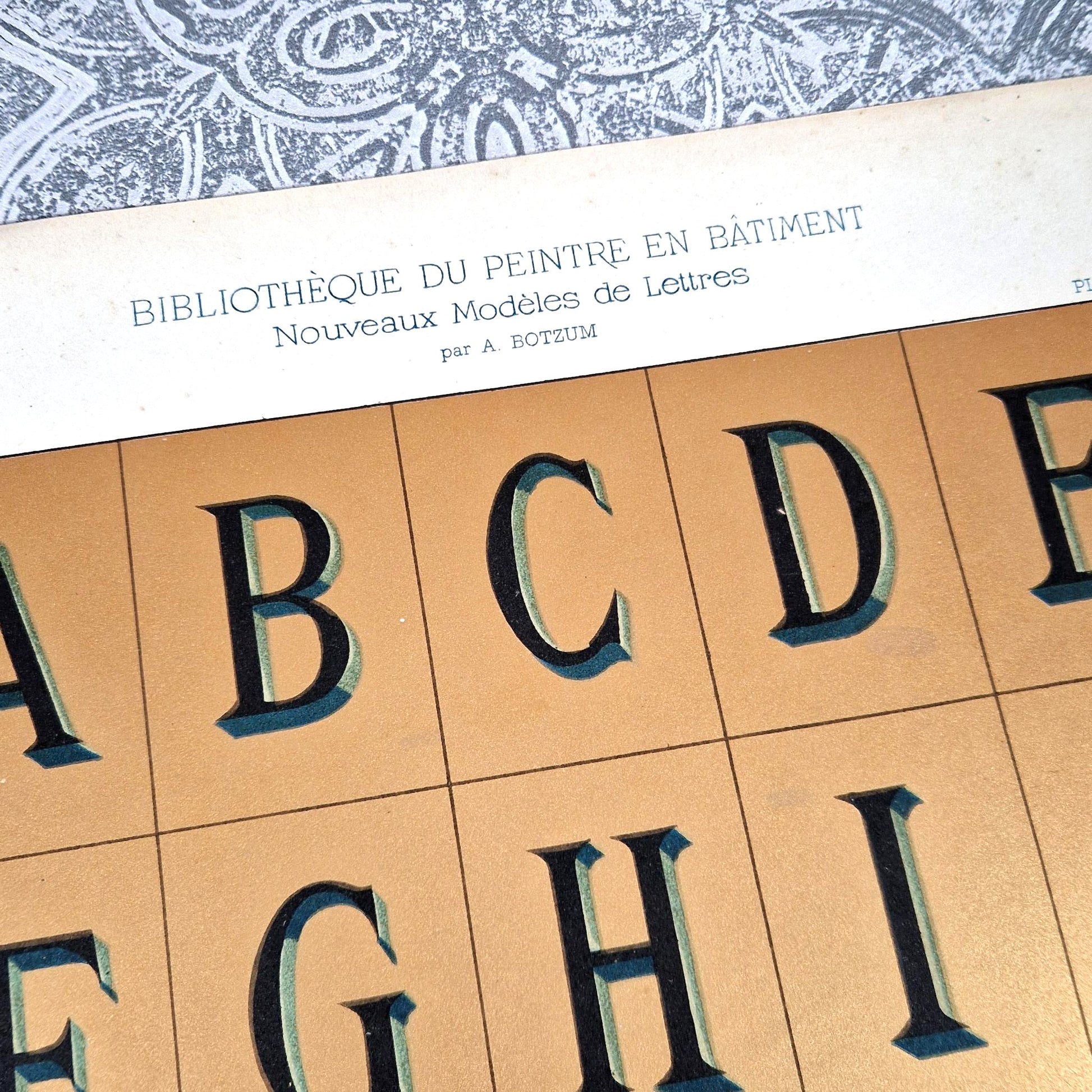 typographie relief bibliotheque botzum