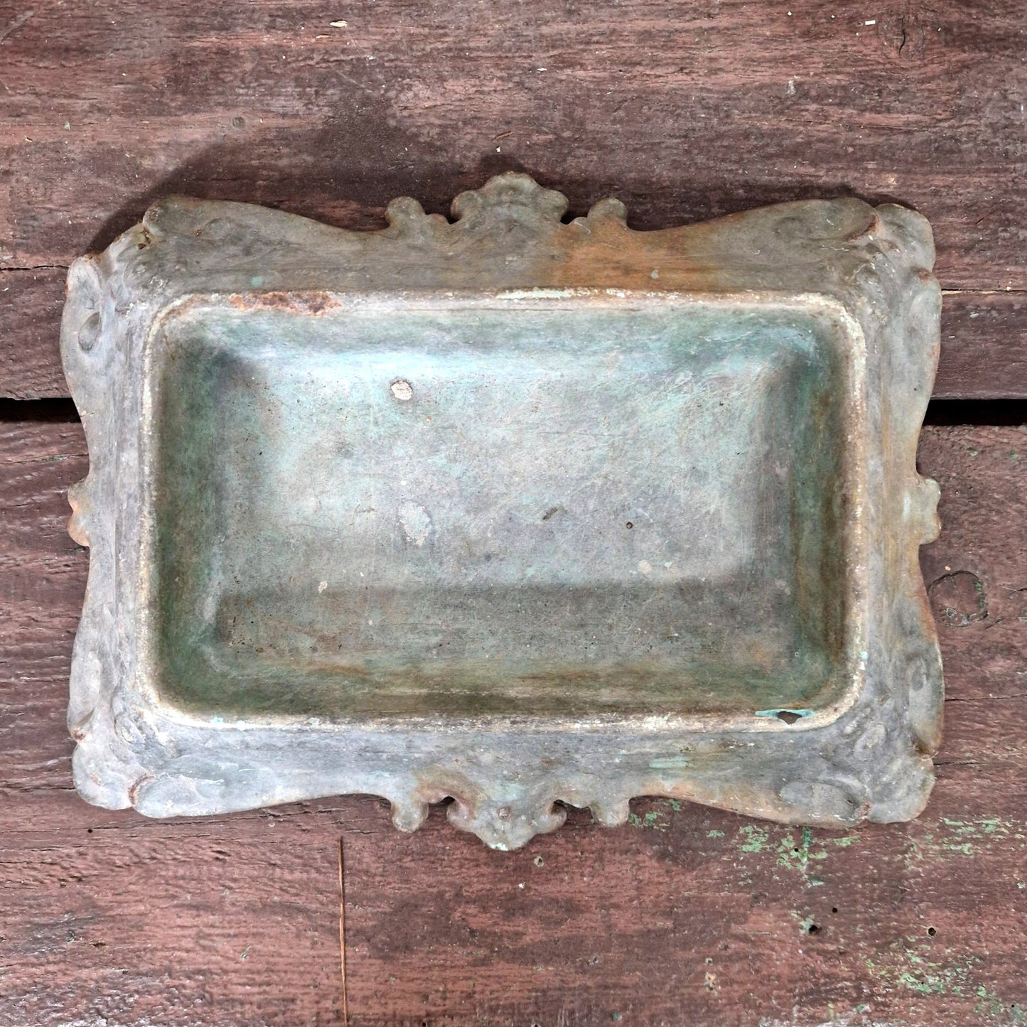 vide poches fonte patine verte