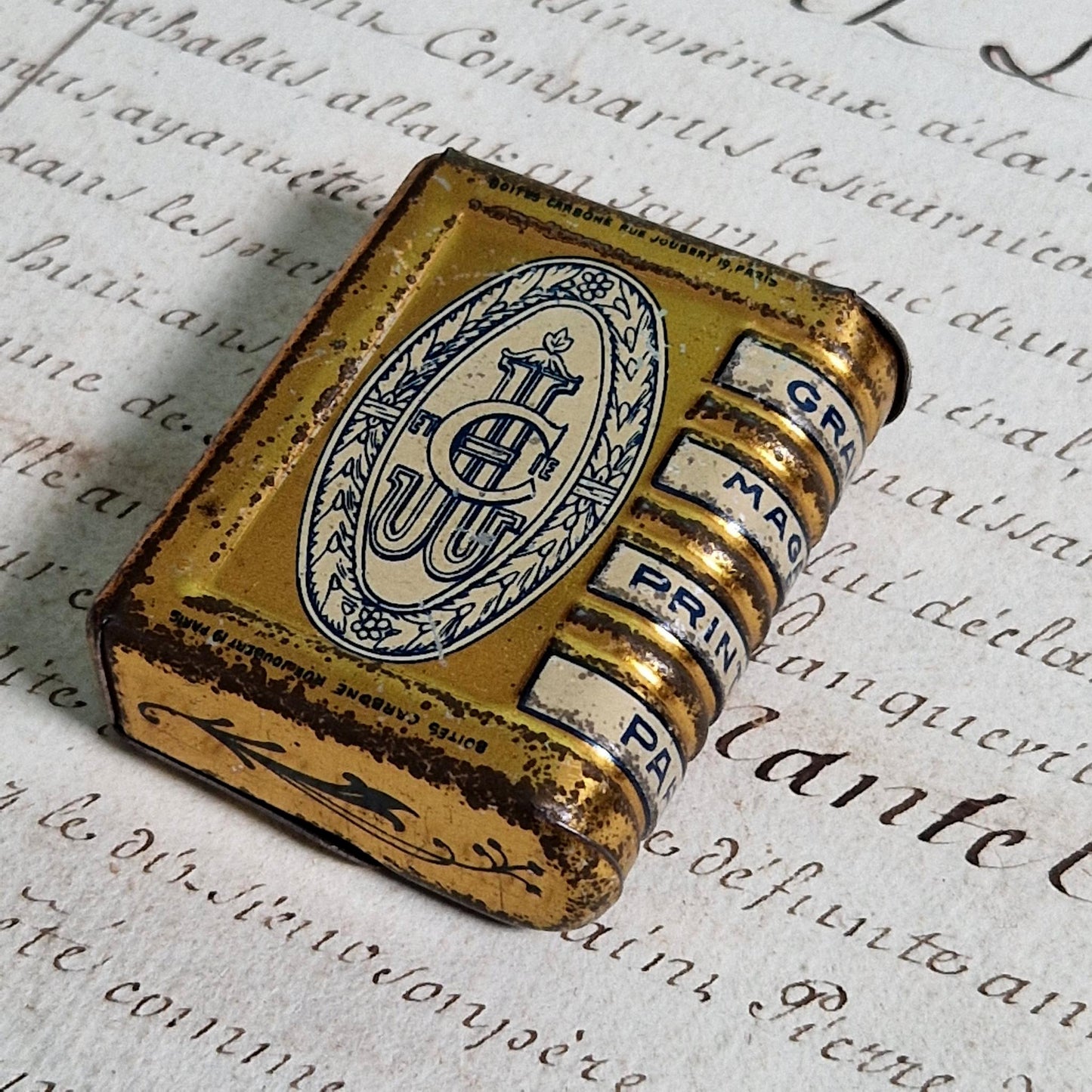 vintage department store advertising tin