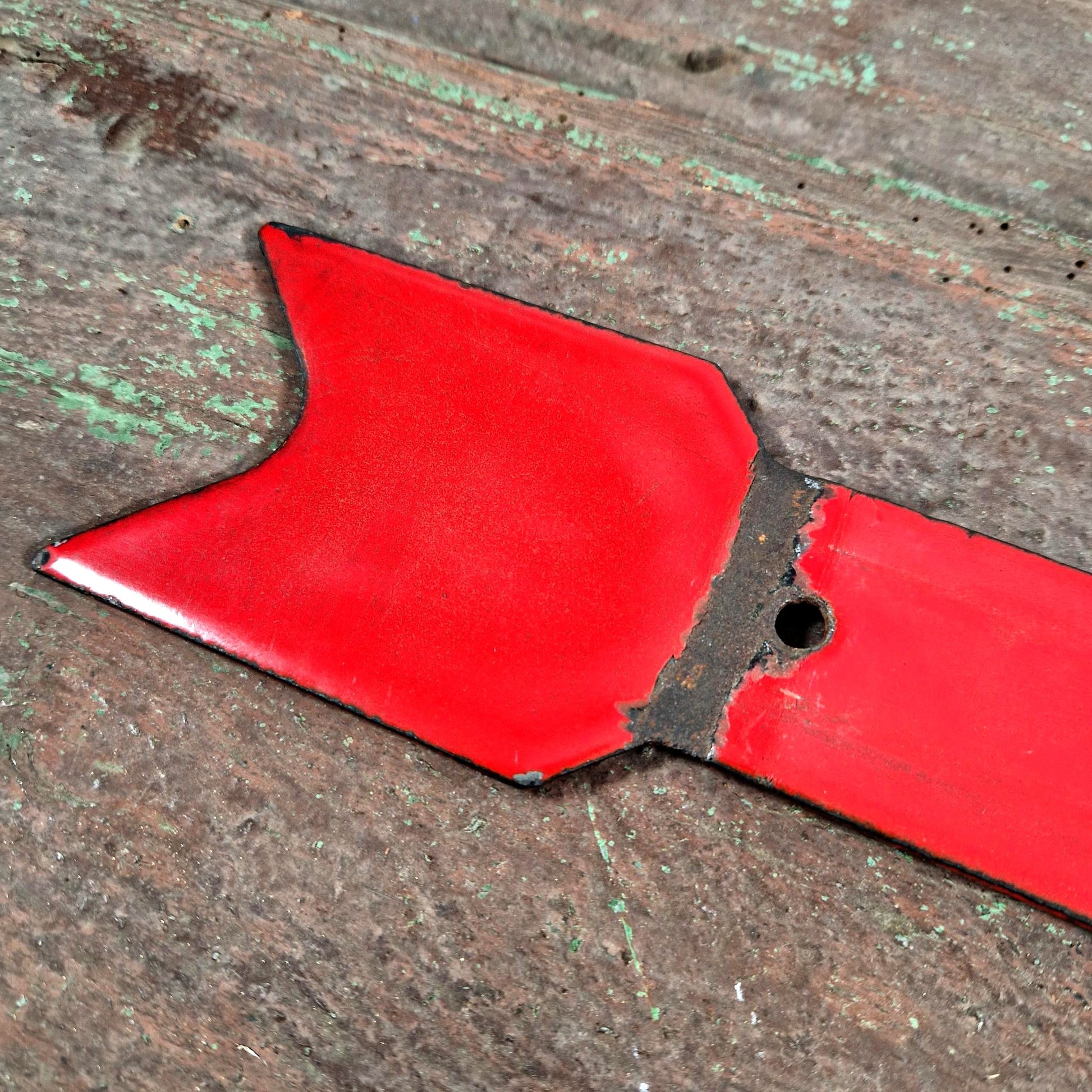 vintage enamel arrow sign red