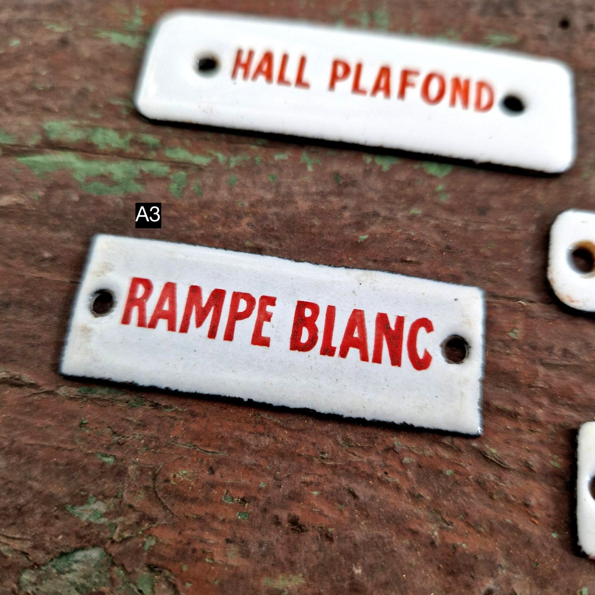 vintage enamel mini signs red text