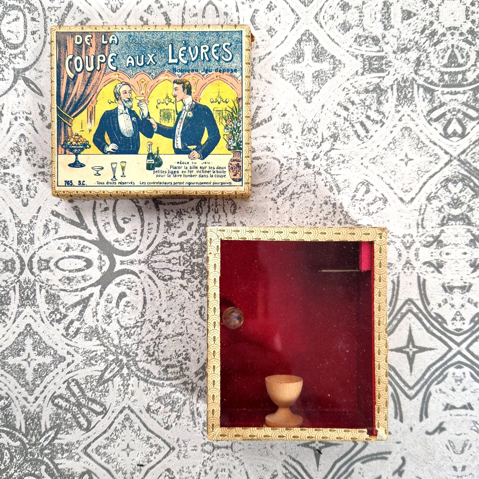 vintage game from glass to lips