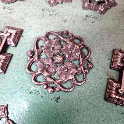 vintage metal ornament sample board