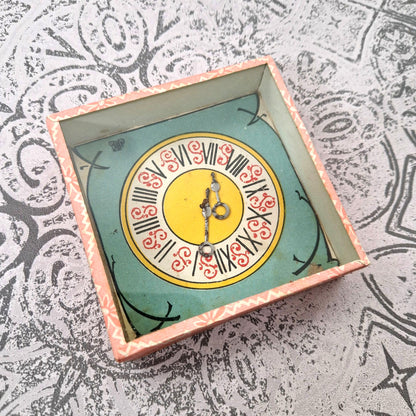 vintage pneumatic clock toy
