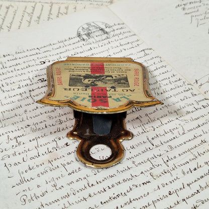 vintage tin advertising clip