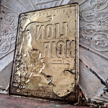 vintage tin sign lion black