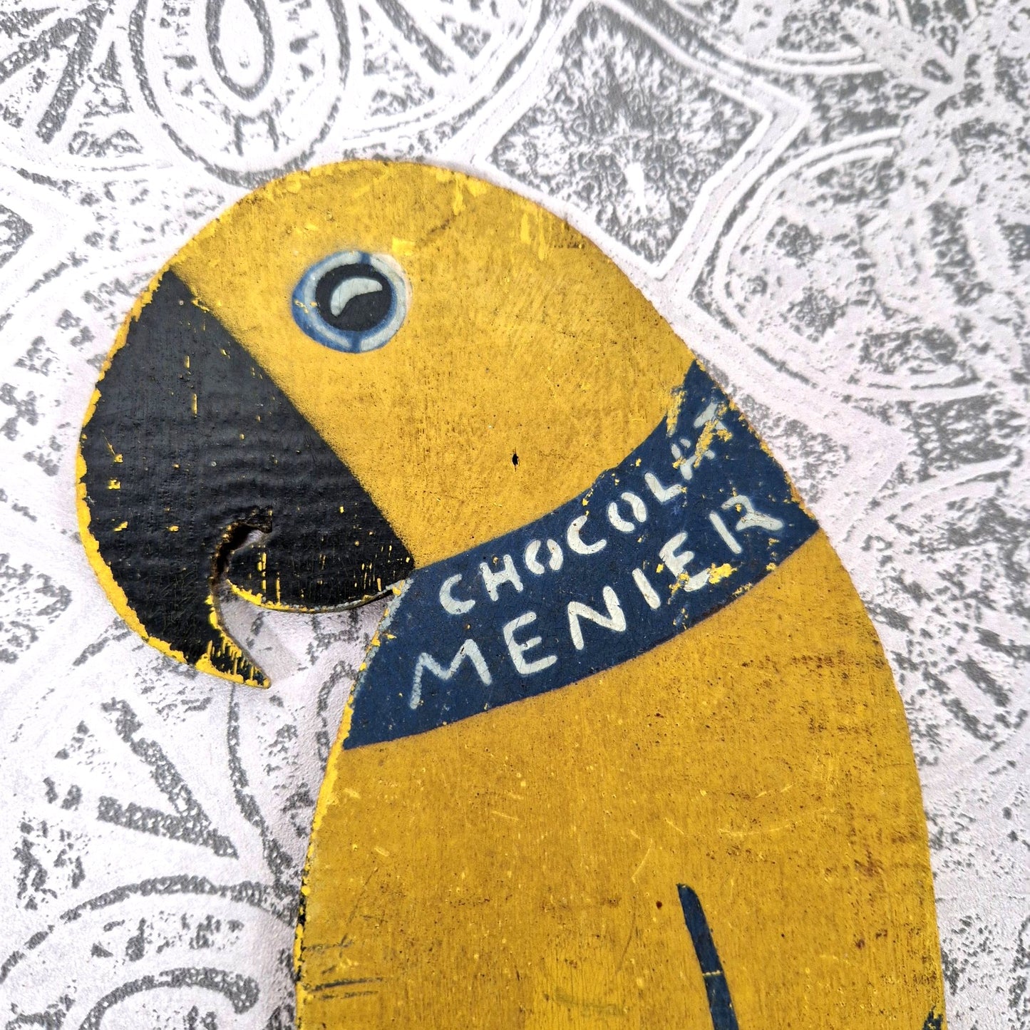 wooden sign menier chocolate parrot